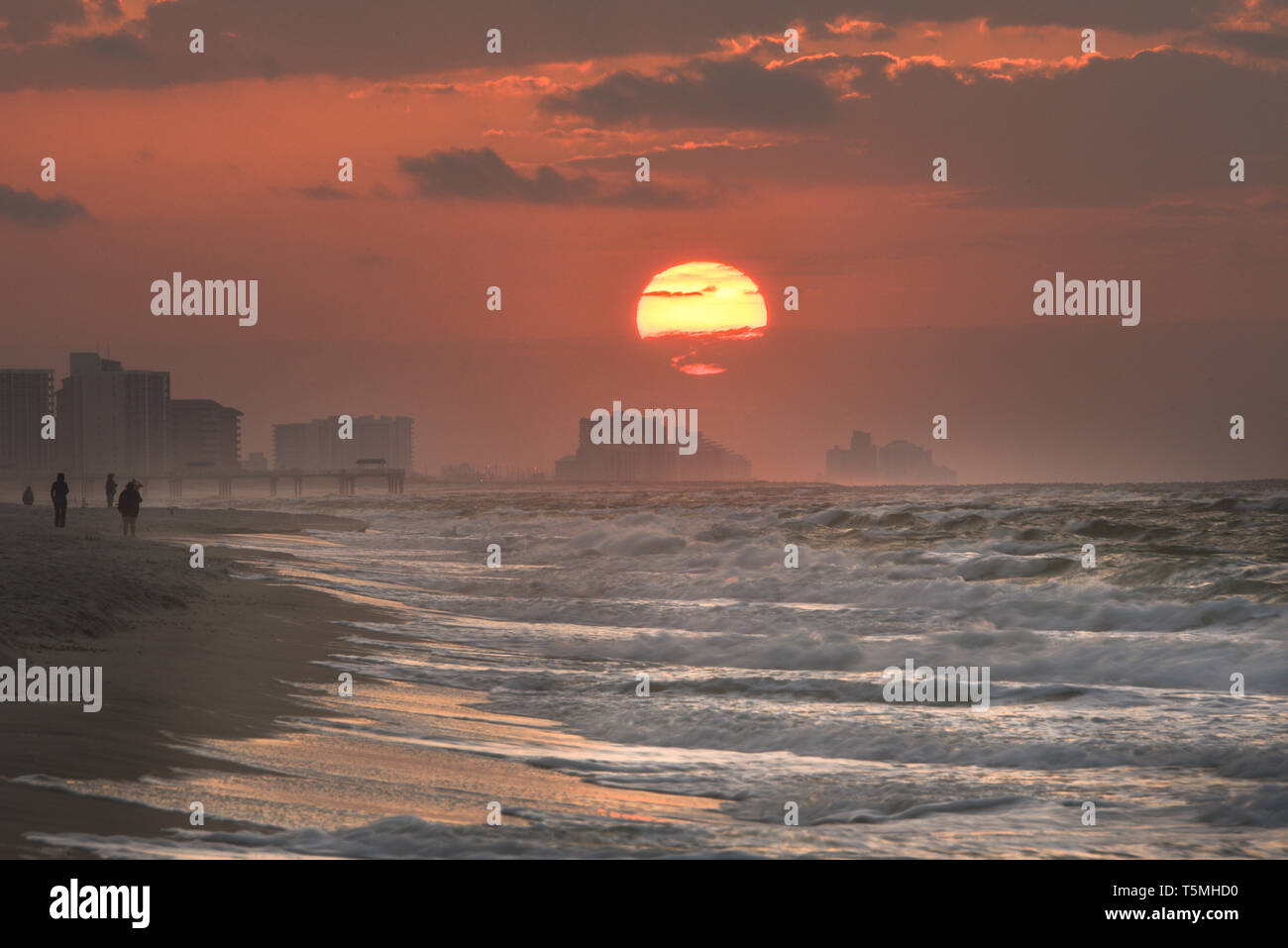 Bright Sunrise With Clouds Along Beach Over Atlantic Ocean With Waves Breaking Along Shoreline In Gulf Shores Orange Beach Alabama Usa Stock Photo Alamy
