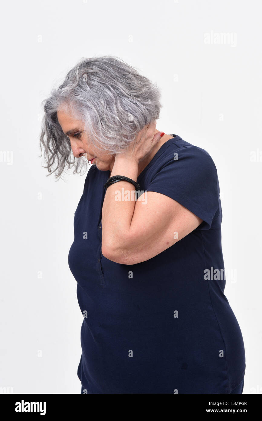 woman with pain on neck Stock Photo