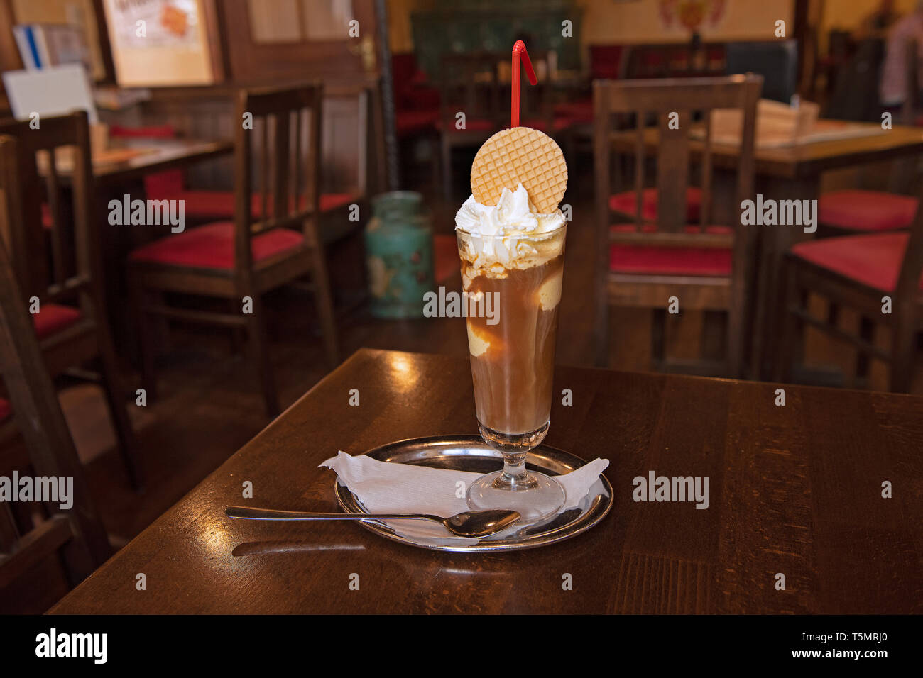 "Eiskaffee" a german speciality Cold coffee with ice cream and whipping cream served in a glass