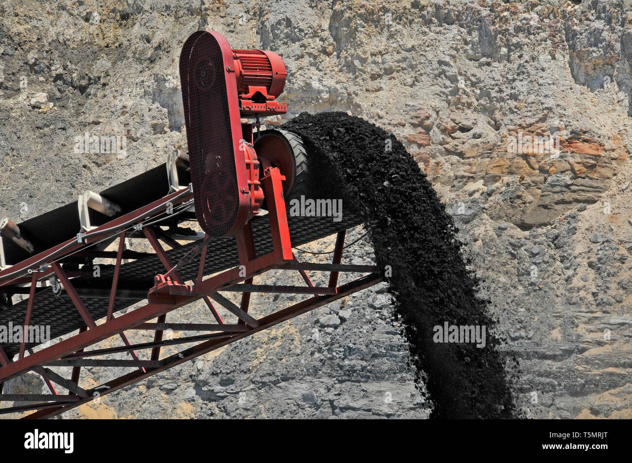 A 'High Wall' machine conveying coal at a major coal mine site. Stock Photo