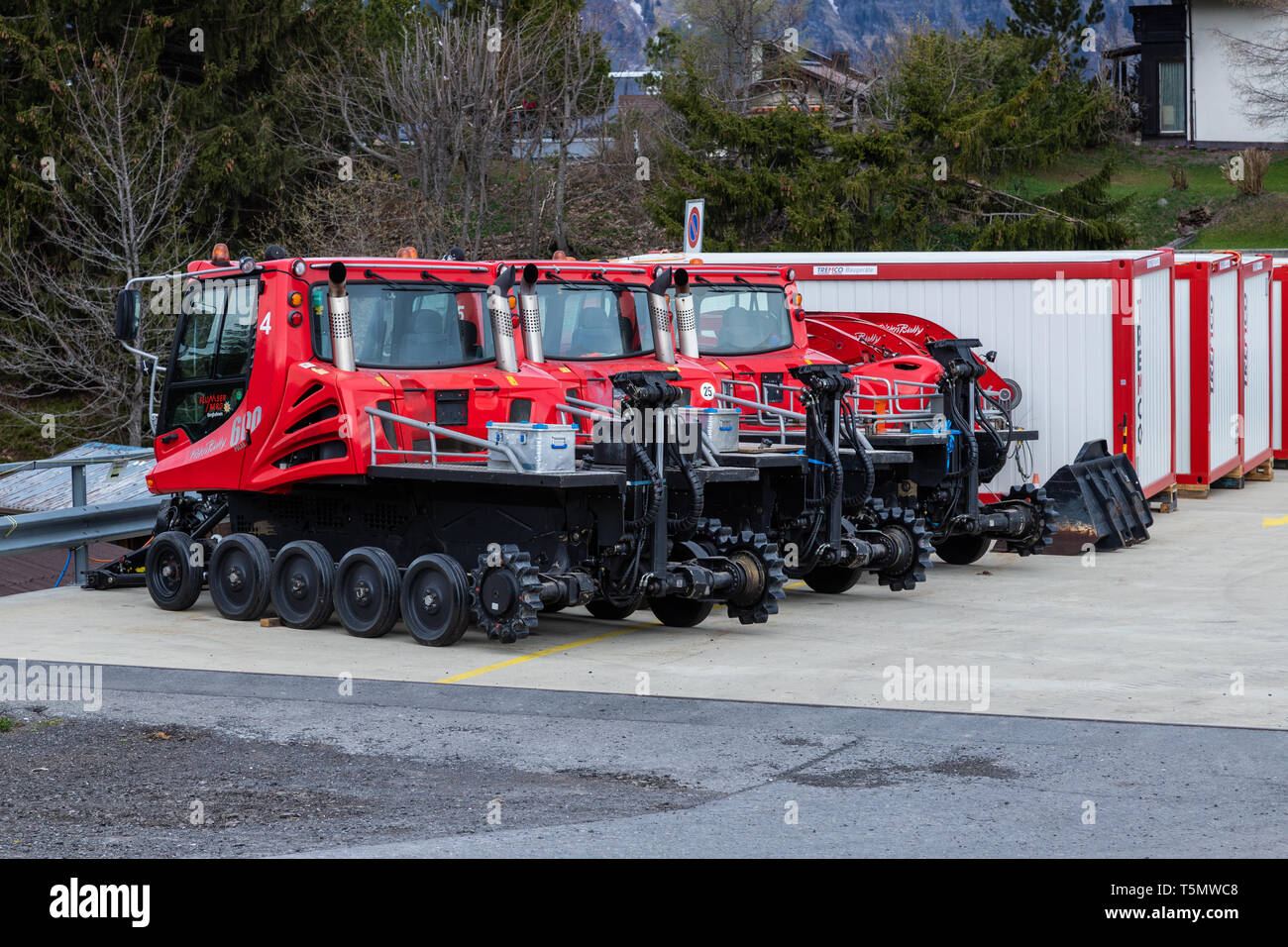 Snow grooming machines after the end of the skiing season in Flumserberg, Switzerland. Stock Photo