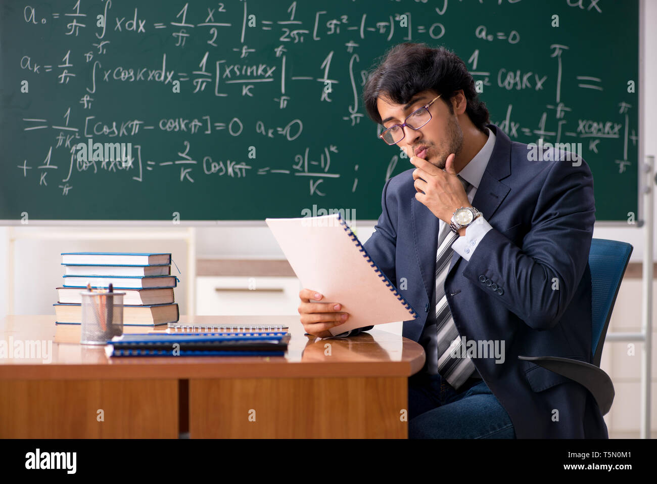 Student looking mathematical formulas hi-res stock photography and ...