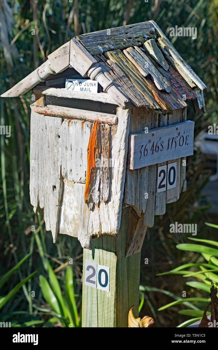A very rustic old letterbox. Stock Photo