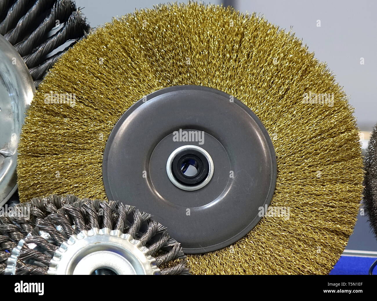 Large industrial wire brush attachment with steel bristles Stock Photo