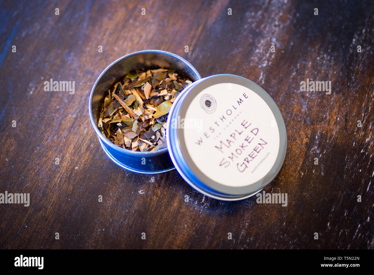 A tin of maple smoked green tea, a Canadian-grown tea from Westholme Tea Farm, near Duncan, British Columbia, Canada Stock Photo