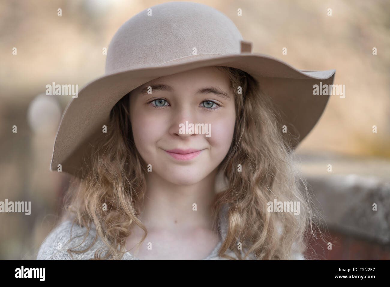 Portrait of a beautiful girl in a hat Stock Photo - Alamy