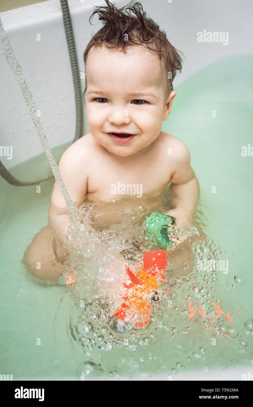 little kid taking bath Stock Photo
