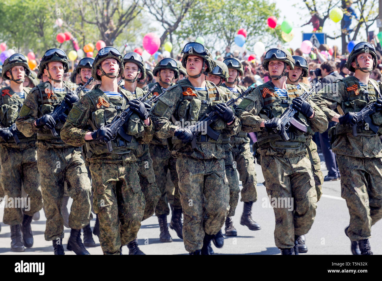Russia, Nakhodka, 05/09/2017. Soldiers in combat camouflage with ...