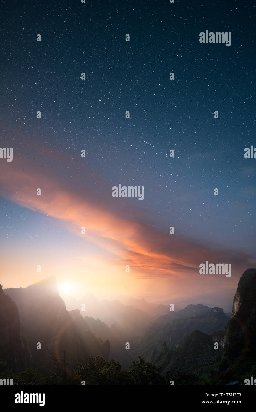 Vertical image of majectic landscape at sunset with stars on the sky Stock Photo