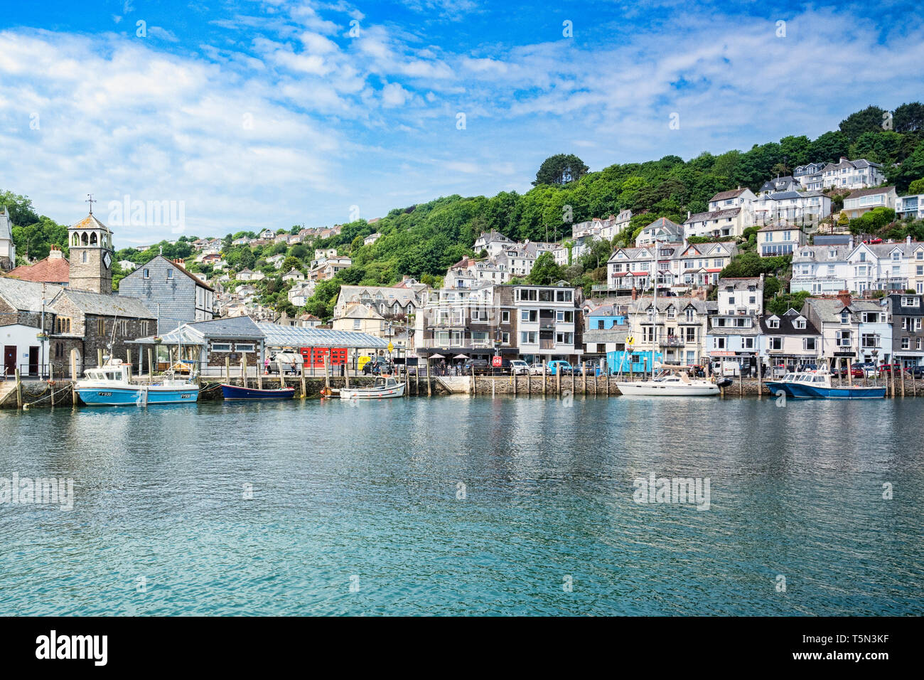 6 June 2018: Looe, Cornwall, UK - The small coastal town of Looe, with the River Looe and hillside houses. Stock Photo