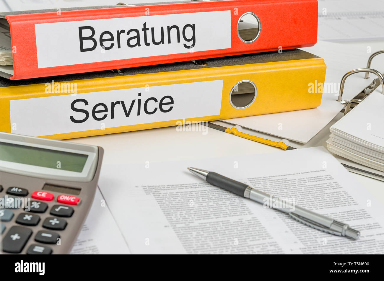 Folders with the german label Beratung und Service - Consulting and Service Stock Photo