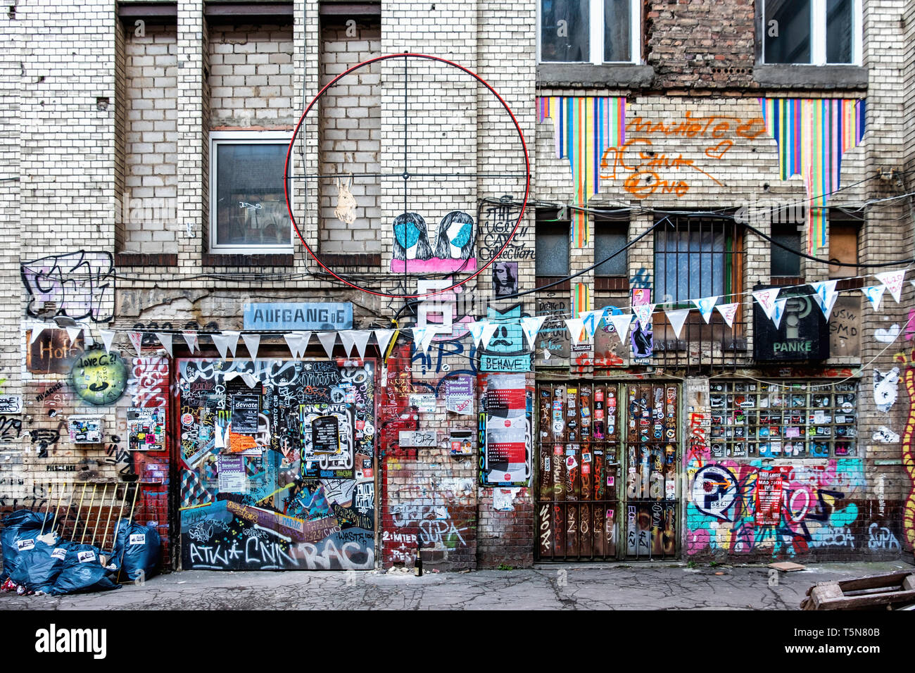 Wedding, Berlin. Inner courtyard of dilapidated old industrial building next to Panke river at Gerichtstrasse 23. Residential & business use. Stock Photo