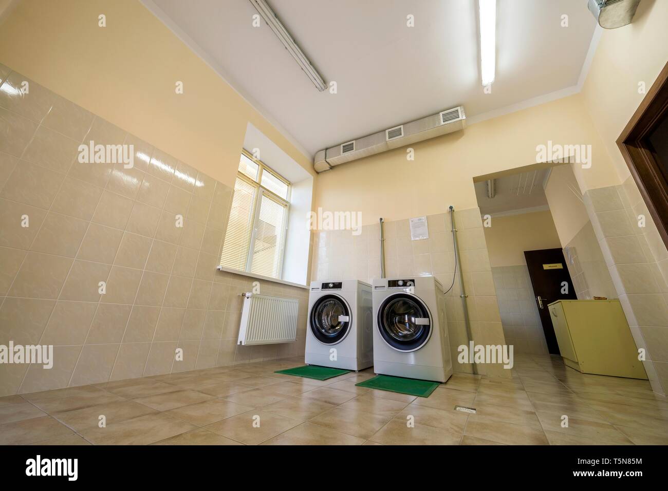 Modern New Industrial Washing Machines On Rubber Insulation
