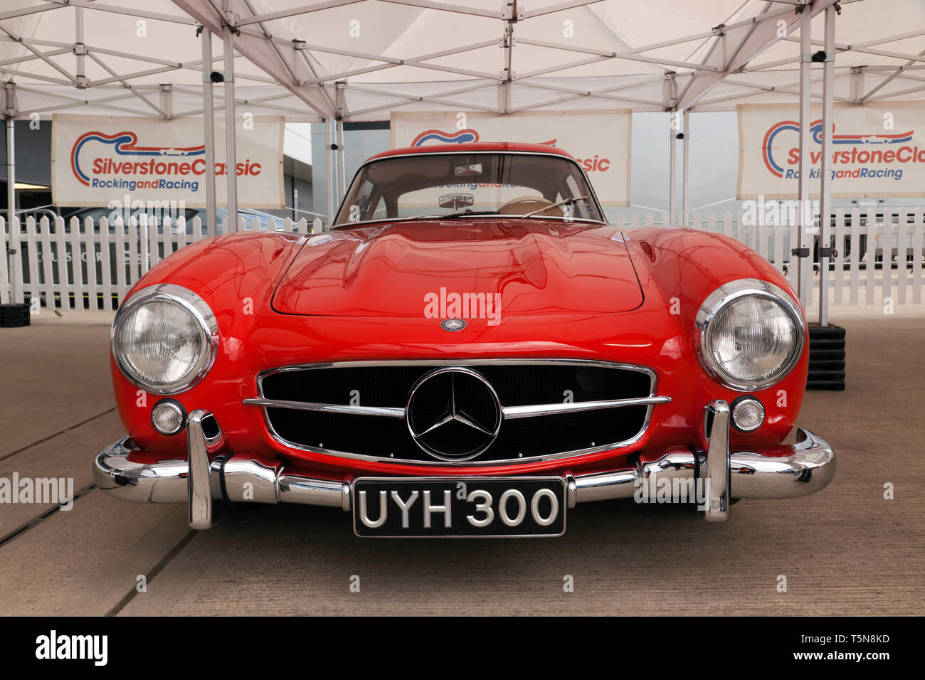 Front view of a beautiful red 1954 Mercedes-Benz  300SL Gullwing  which will be for sale in the 2029 Silverstone Classic Car Auction Stock Photo