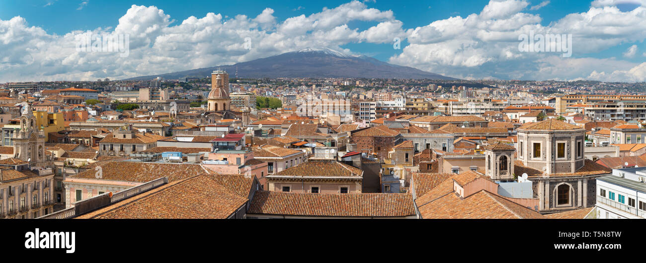 Catania - The town and Mt. Etna volcano in the background. Stock Photo