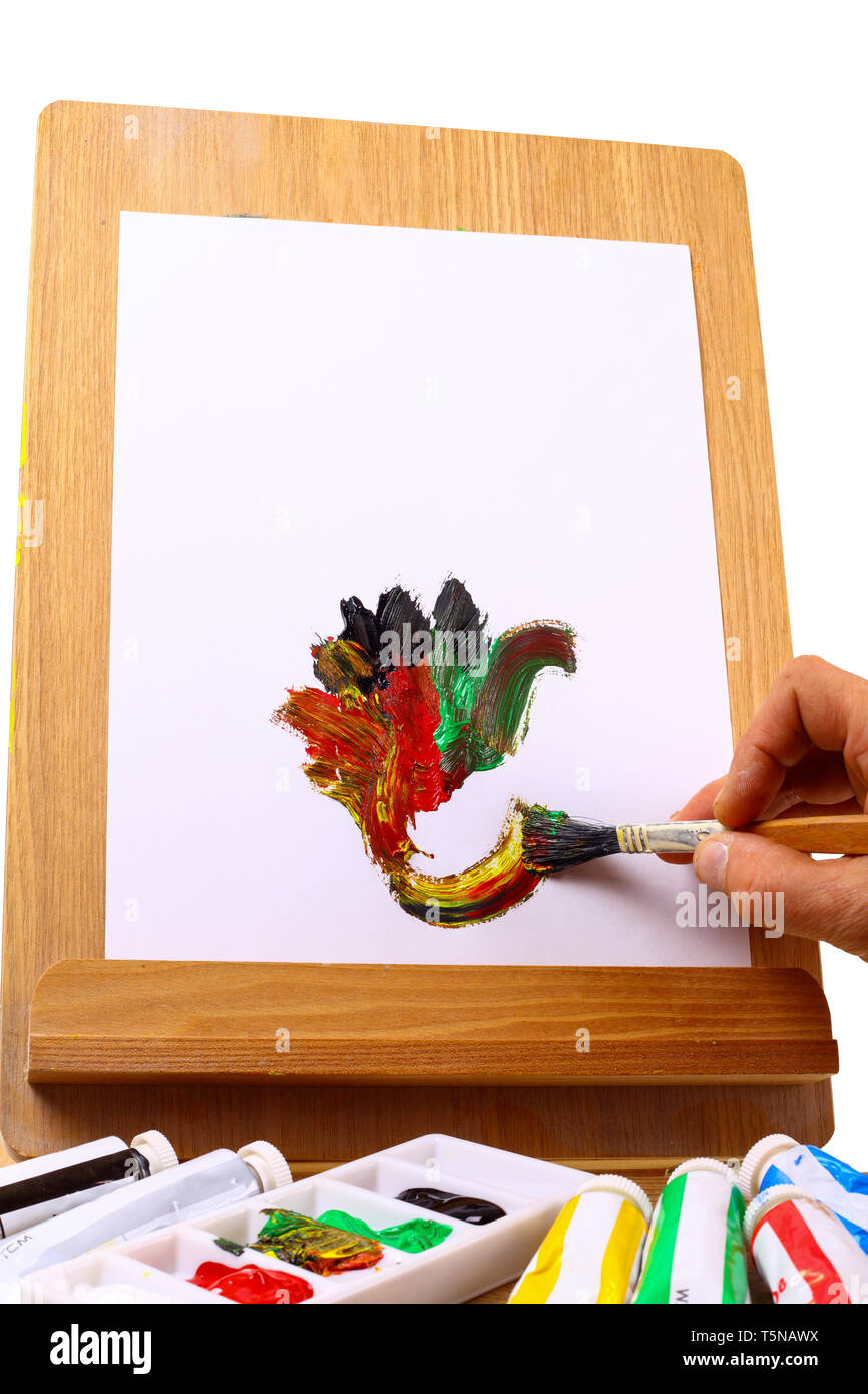 Hand painted on an easel - isolated on a white background Stock Photo