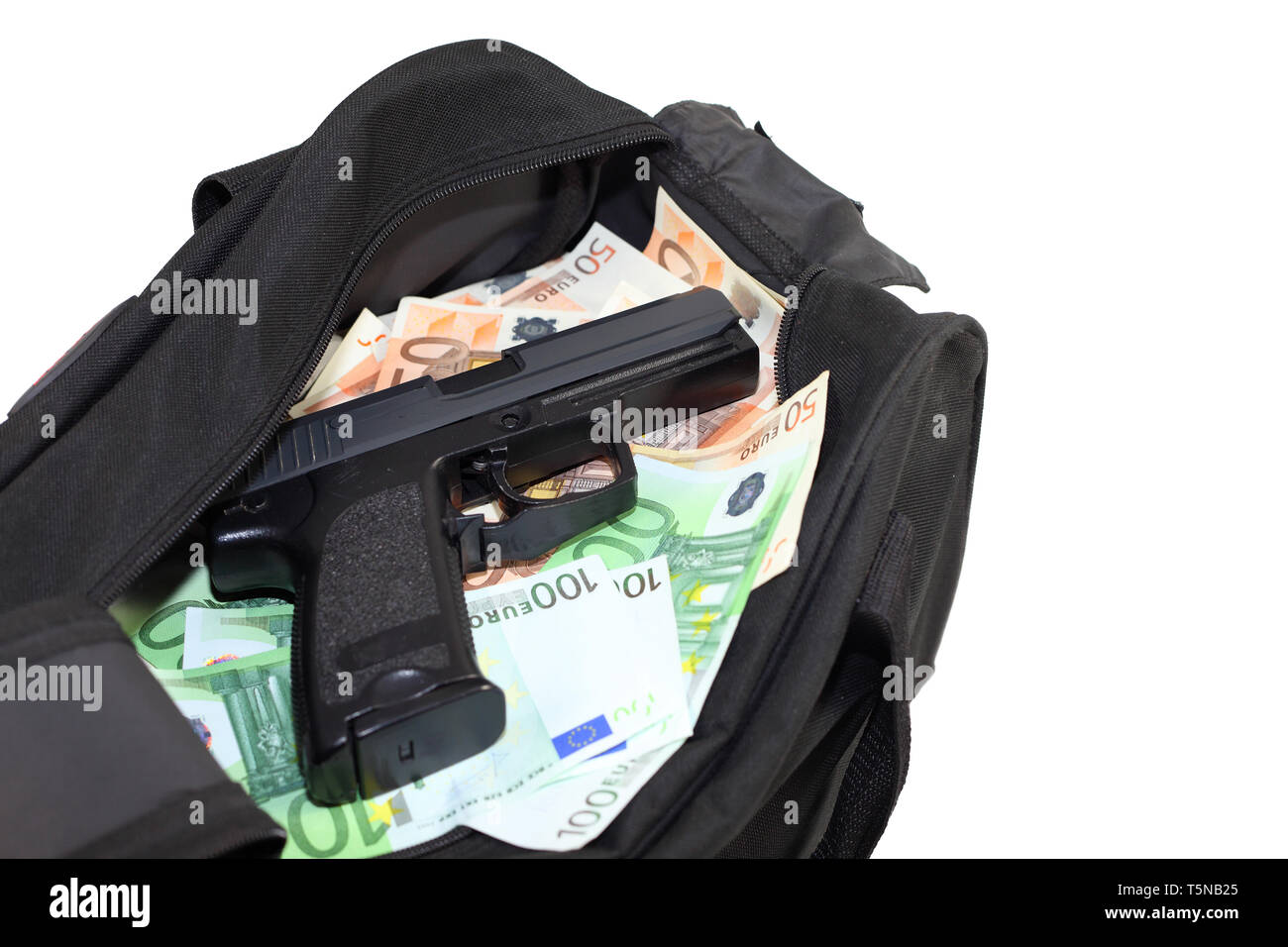 Loot from bank robbery. Sports bag full of money with gun - isolated Stock Photo