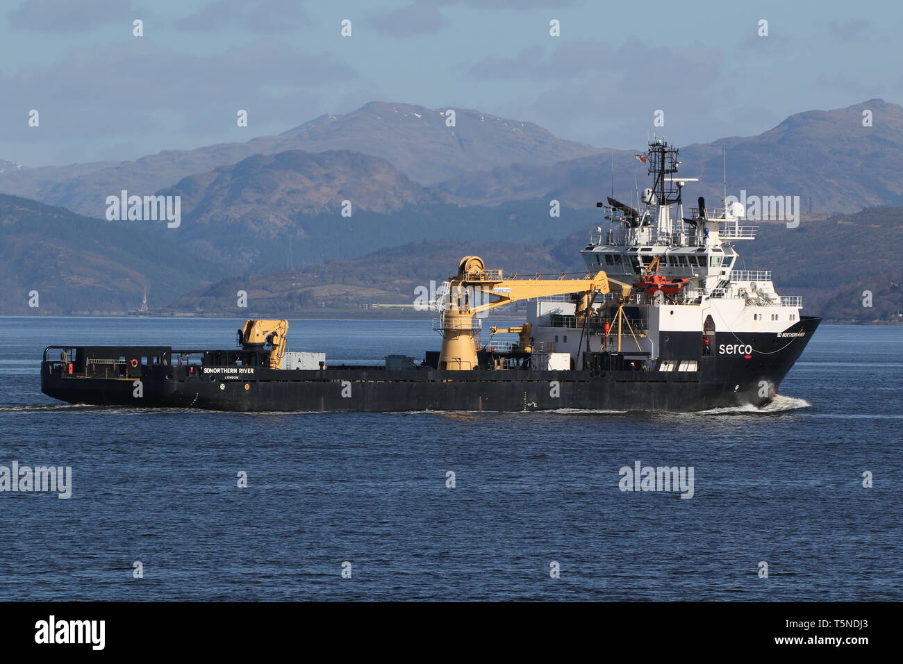 SD Northern River, a support vessel operated by Serco Marine Services, manoeuvering off Gourock at the start of Exercise Joint Warrior 19-1. Stock Photo