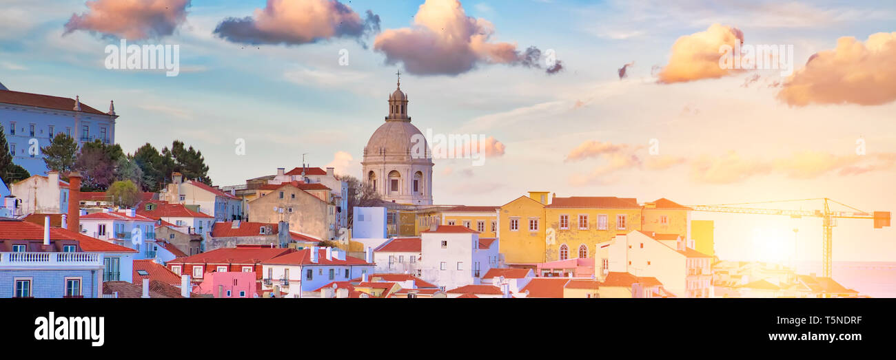 Scenic Alfama lookout with San Vicente (Saint Vincent) statue and Sao Vicente de Fora a church on the background Stock Photo