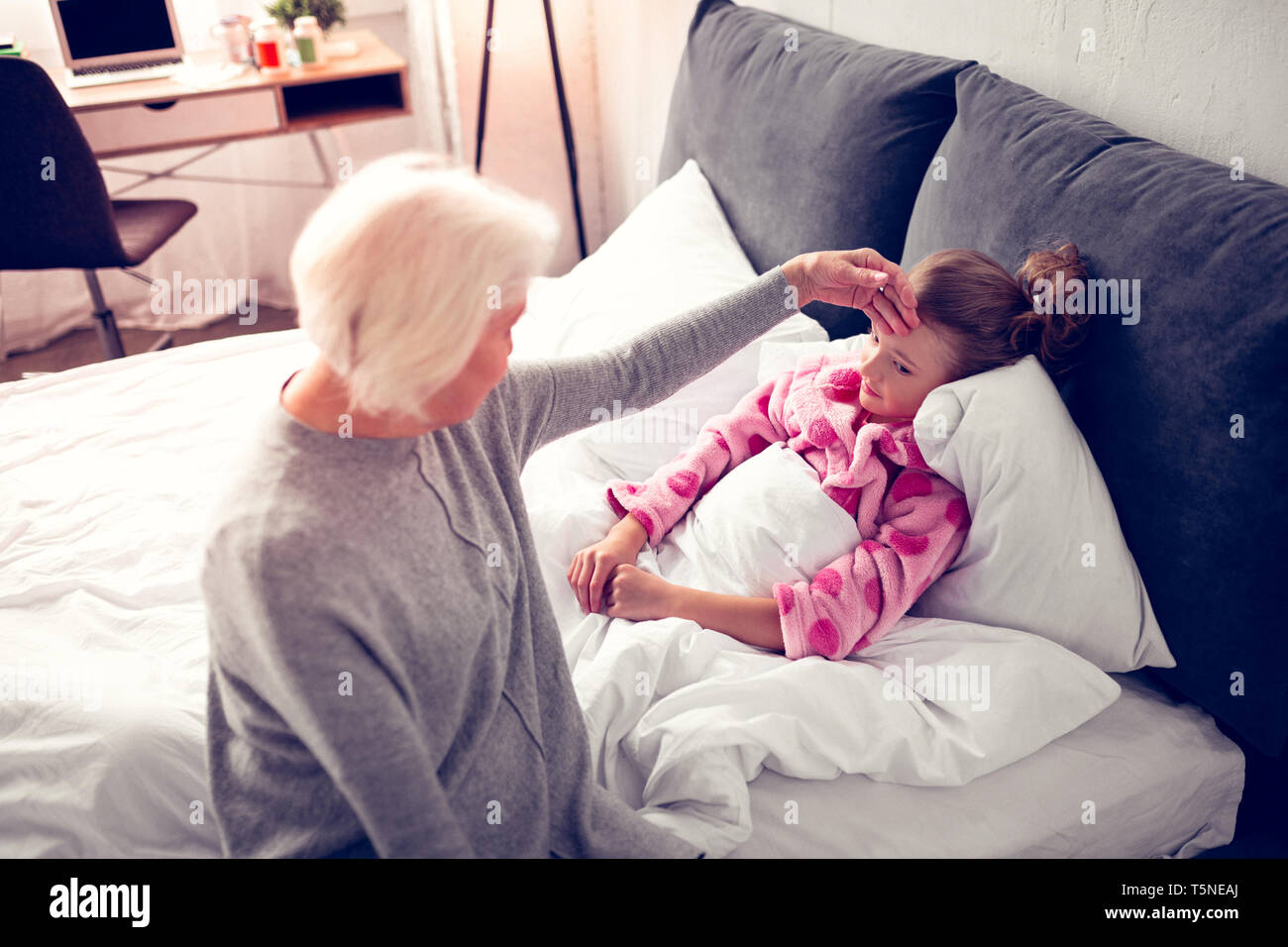 Granny in bed hi-res stock photography and images - Alamy