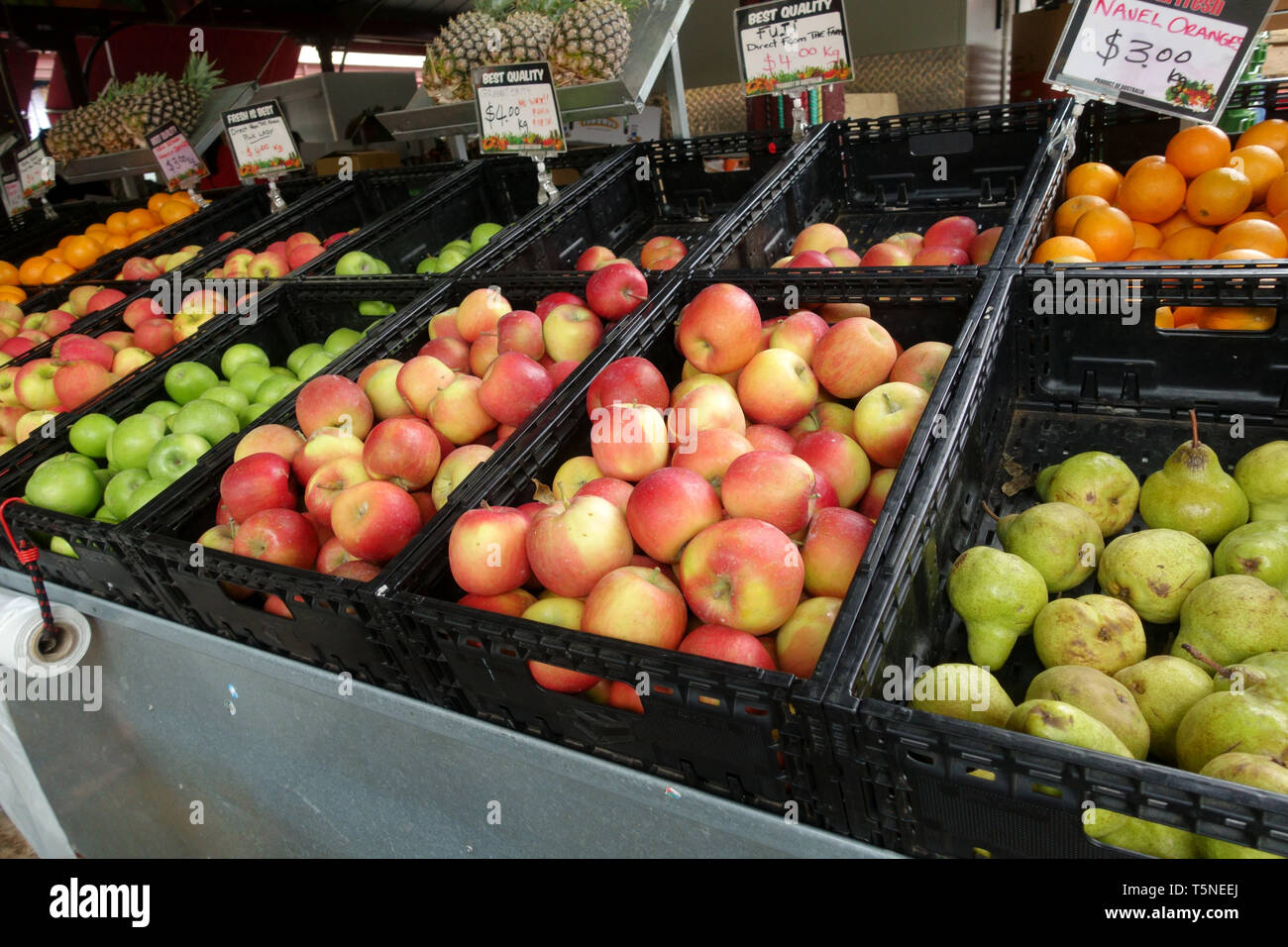 Fresh fruits, apples and pears and oranges being sold at Queen Victoria Market Melbourne Victoria Australia Stock Photo