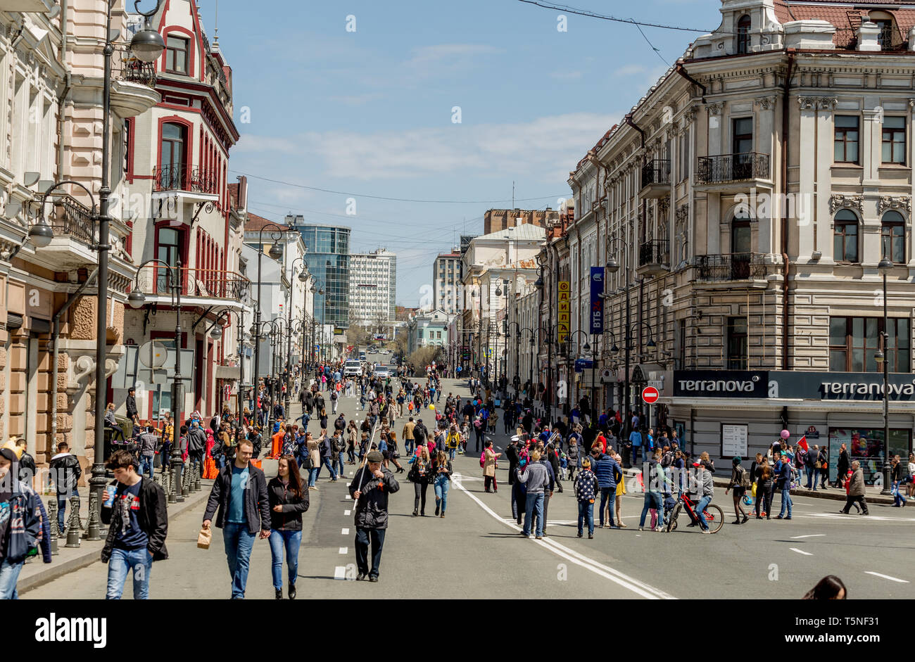 Russia, Vladivostok, 05/09/2018. A lot of people walking in the city downtown during the celebration of the annual Victory Day on May 9. Celebration i Stock Photo