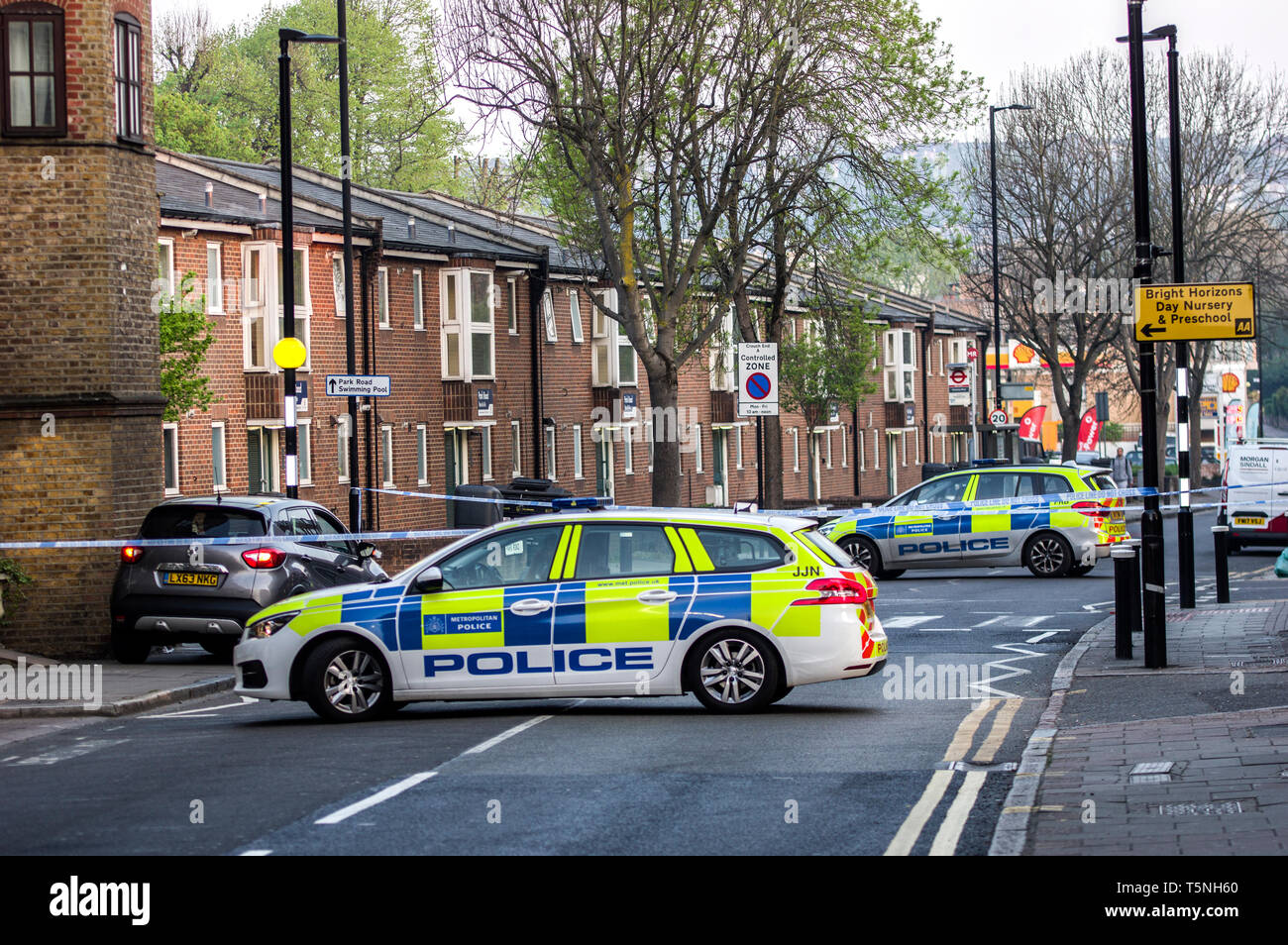 Car accident with two police cars and the scene cordoned off with