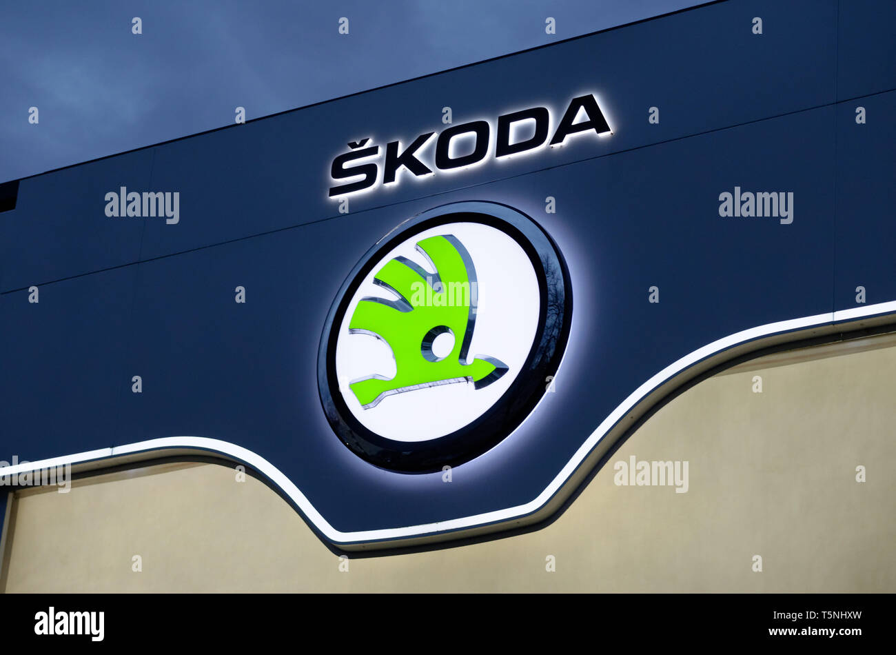 Skoda car company logo on dealership building Stock Photo