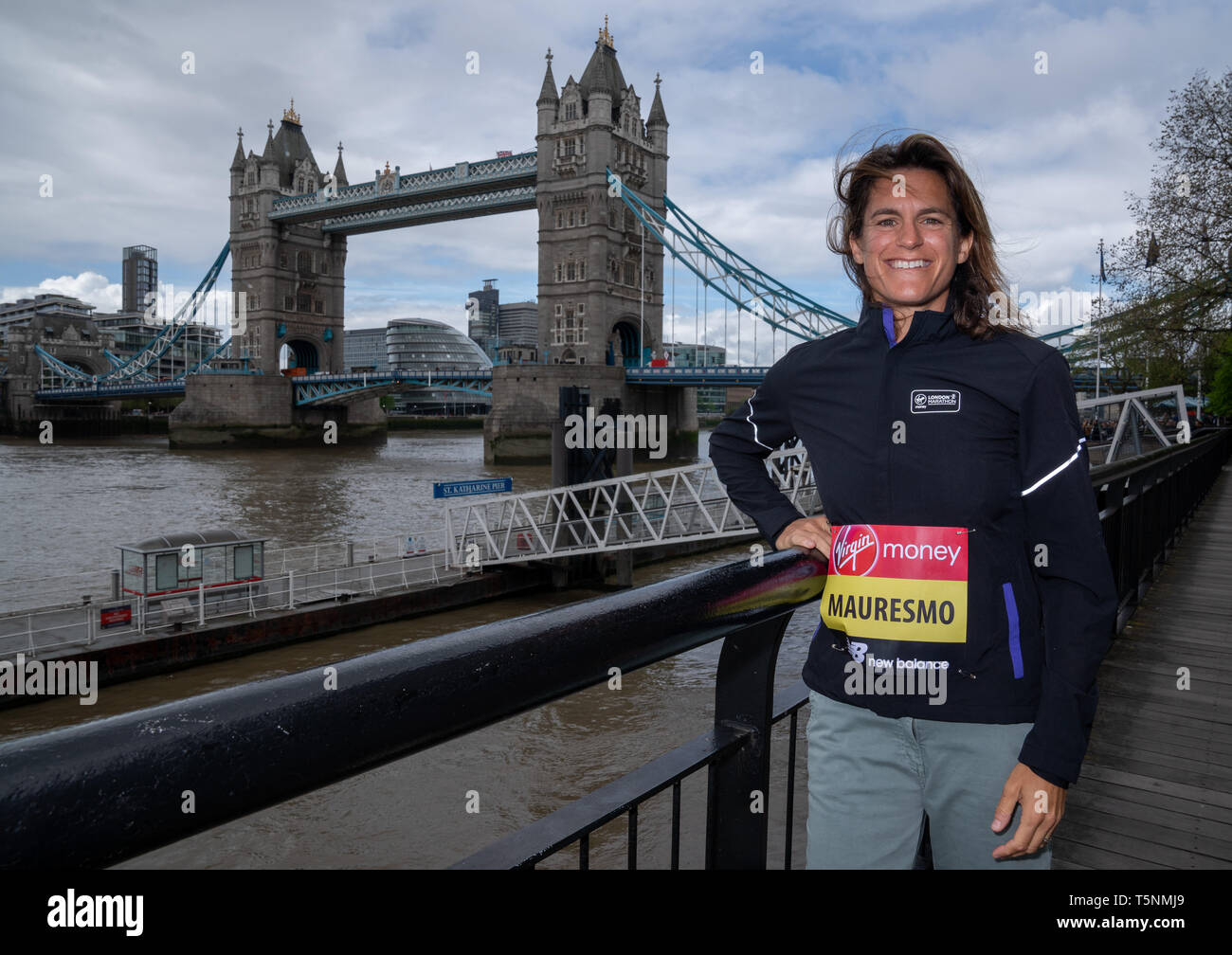 French former professional tennis player Amelie Mauresmo, will be running this years London Marathon, poses at a photocall at the Guoman Tower Hotel. Stock Photo