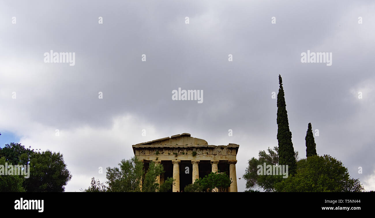 Panoramic photo of the temple of Hephaestus in Athens, Greece. Cloudy sky with empty space for text. Stock Photo