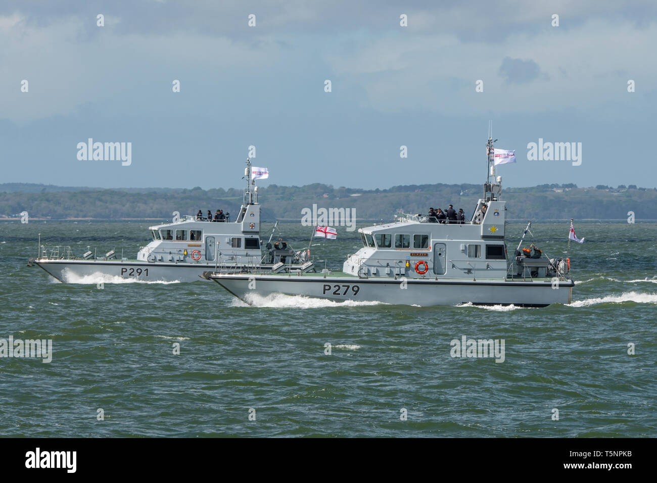Royal Navy Archer Class patrol boats from the 1st Patrol Boat Squadron head out to sea for a training exercise off Portsmouth, UK on 25/4/19. Stock Photo