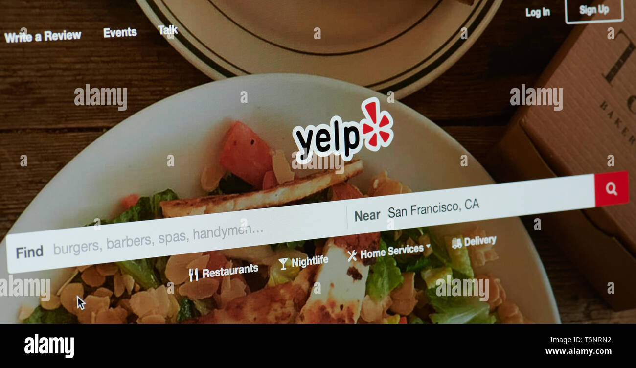 New york, USA - april 22, 2019: Yelp home page on laptop screen close up Stock Photo