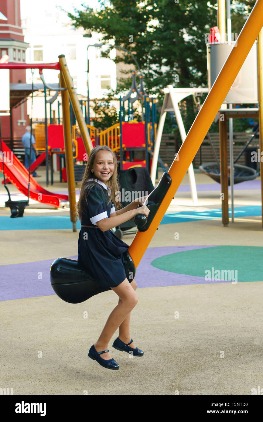 Teen Girl Having Fun On The Playground After School Leisure