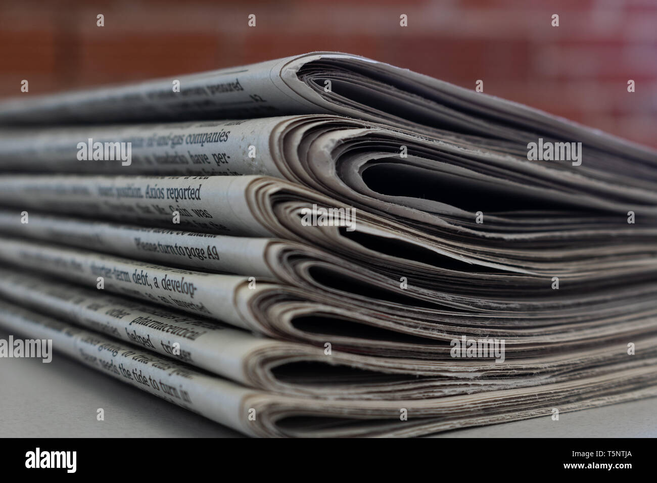 Stack of newspapers Stock Photo