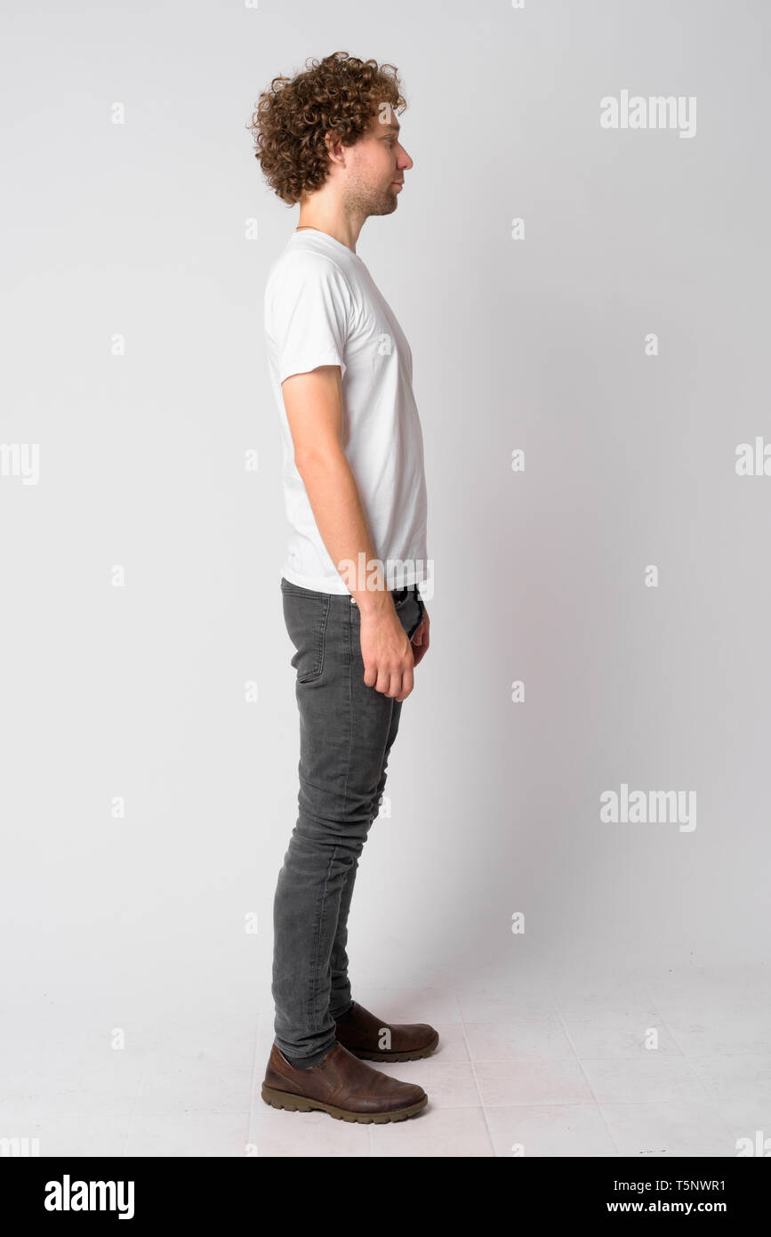 Young man curly hair blue eyes hi-res stock photography and images - Alamy