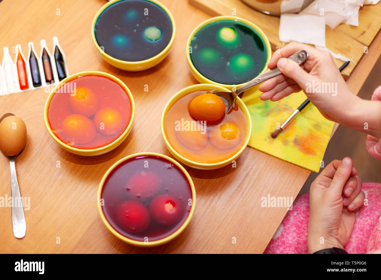Person who painting easter eggs,  Dyed Easter eggs Stock Photo