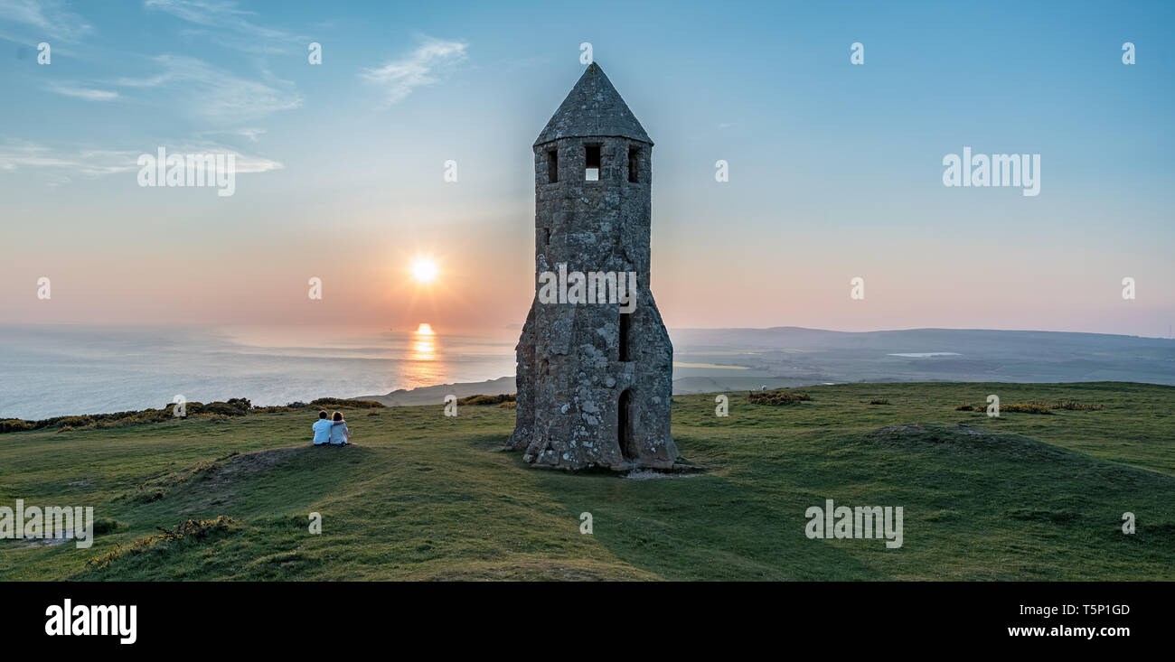 A couple watching the sunset at St. Catherine's Oratory Stock Photo