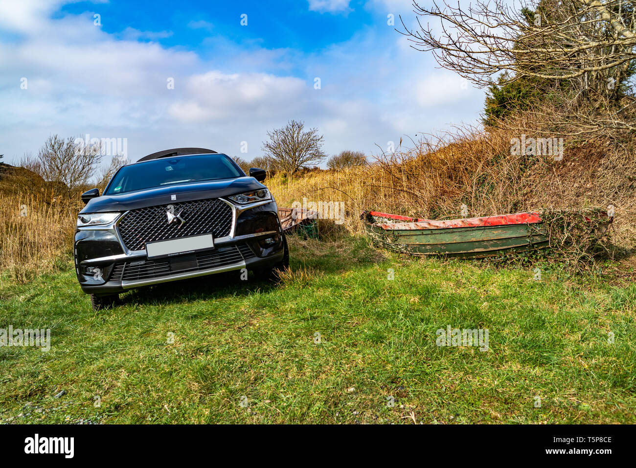 PORTNOO, DONEGAL / IRELAND - FEBRUARY 27 2019 : DS 7 Crossback Rivoli standing in the wilderness next to boat. Stock Photo