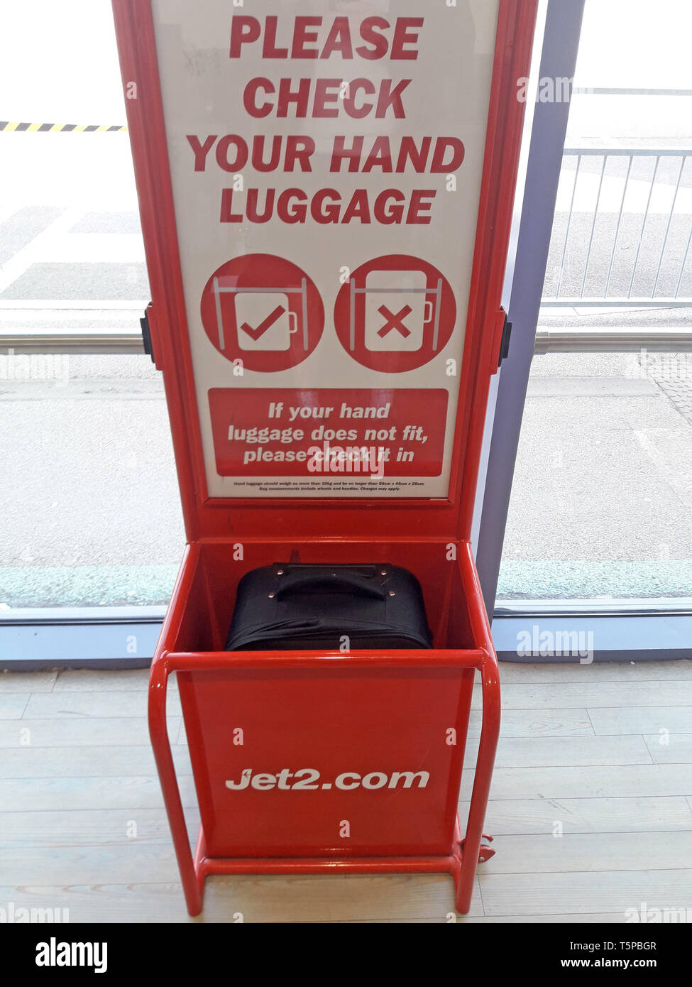 Jet2.com Jet 2 hand luggage bag frame size tester at East Midlands airport in Leicestershire, UK. April 13, 2019. Stock Photo