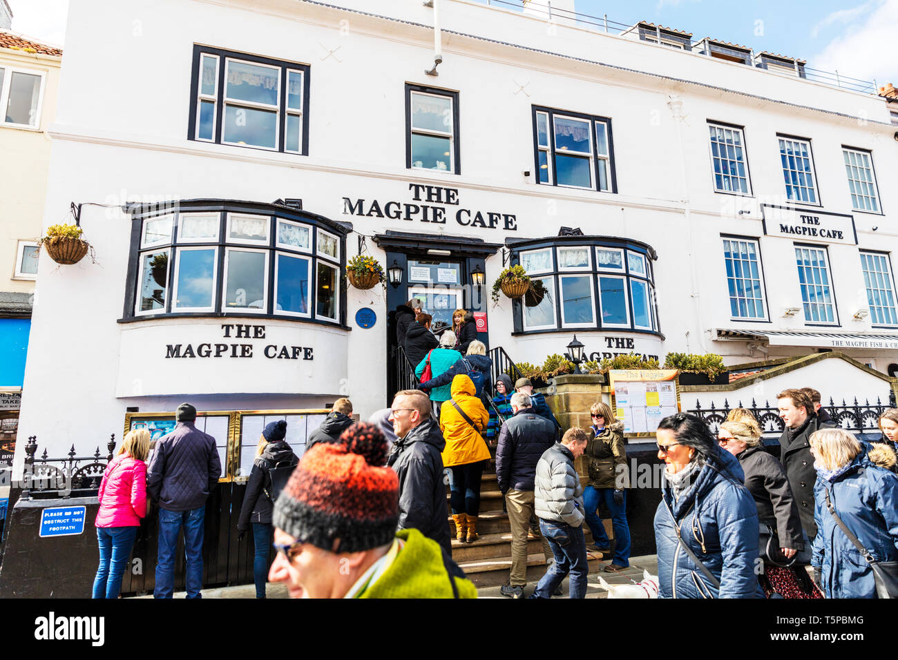The Magpie Cafe Whitby, Whitby Yorkshire UK England, Magpie Cafe Whitby, Magpie fish and chips Whitby, Whitby Cafes, Whitby Cafe, queuing, queue, Stock Photo