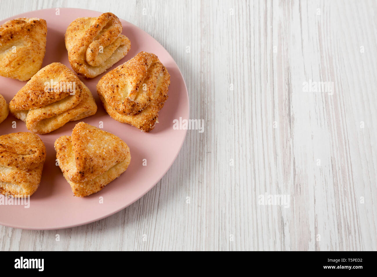 Homemade Cottage Cheese Biscuits On A Pink Plate Over White Wooden