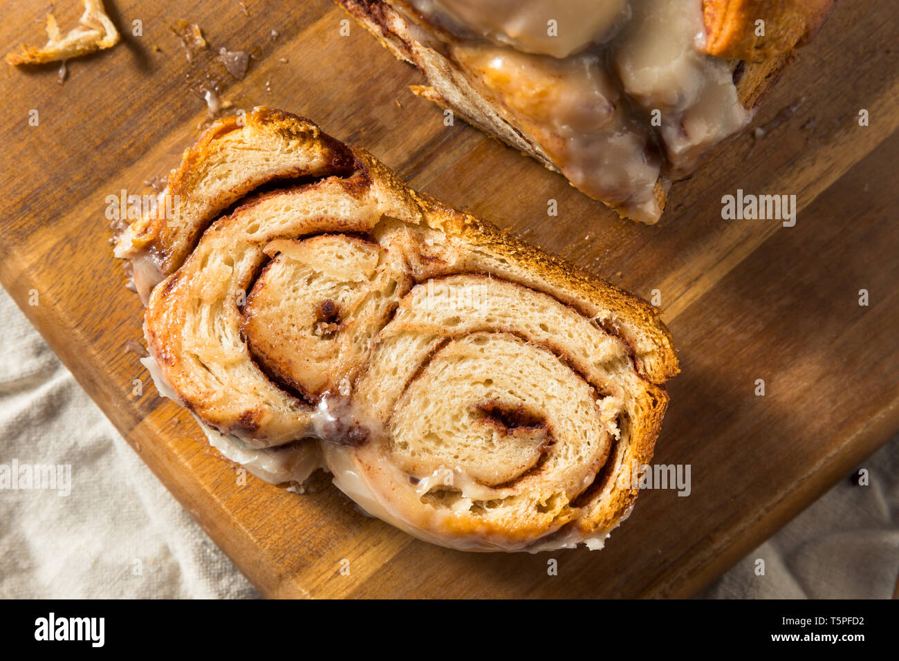 Homemade Sweet Cinnamon Roll Bread Loaf with Icing Stock Photo