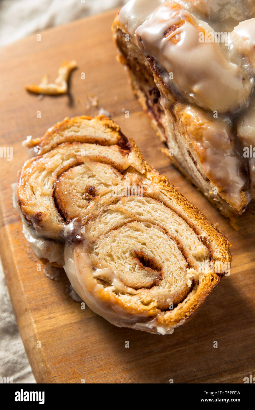 Homemade Sweet Cinnamon Roll Bread Loaf with Icing Stock Photo