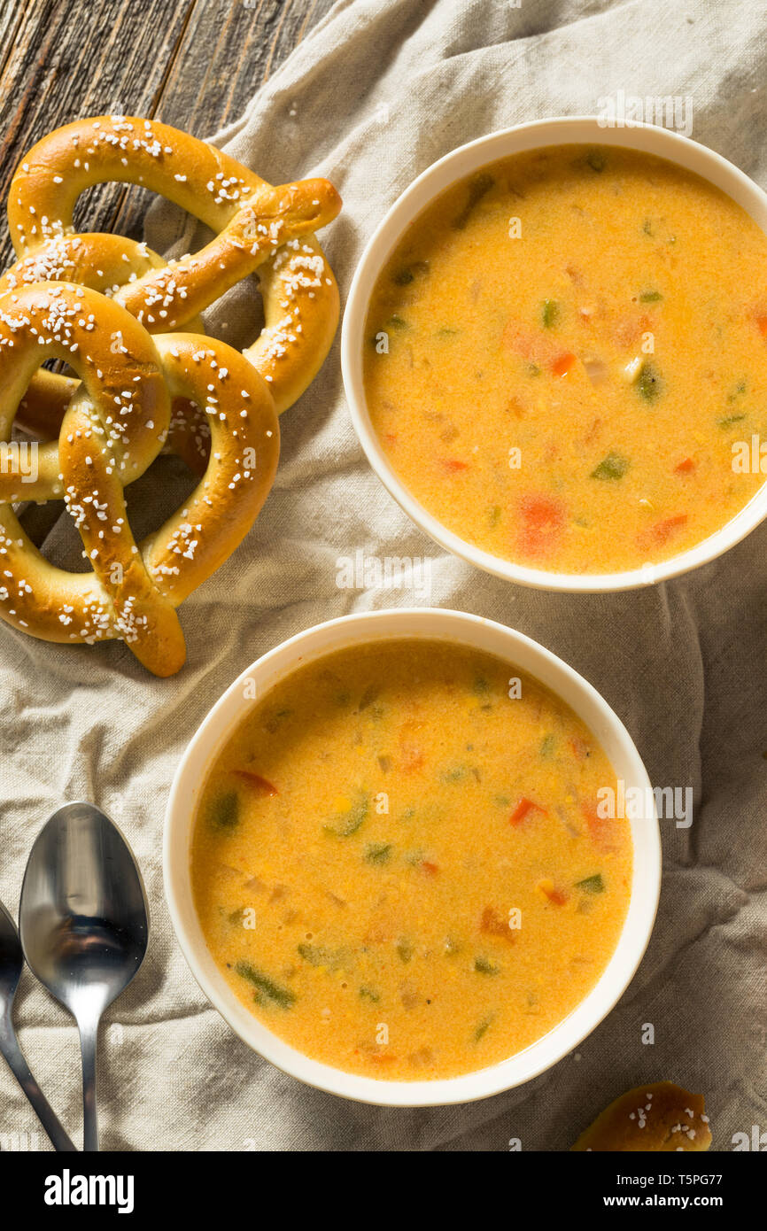 Homemade Beer Cheese Soup with Soft Pretzels Stock Photo Alamy