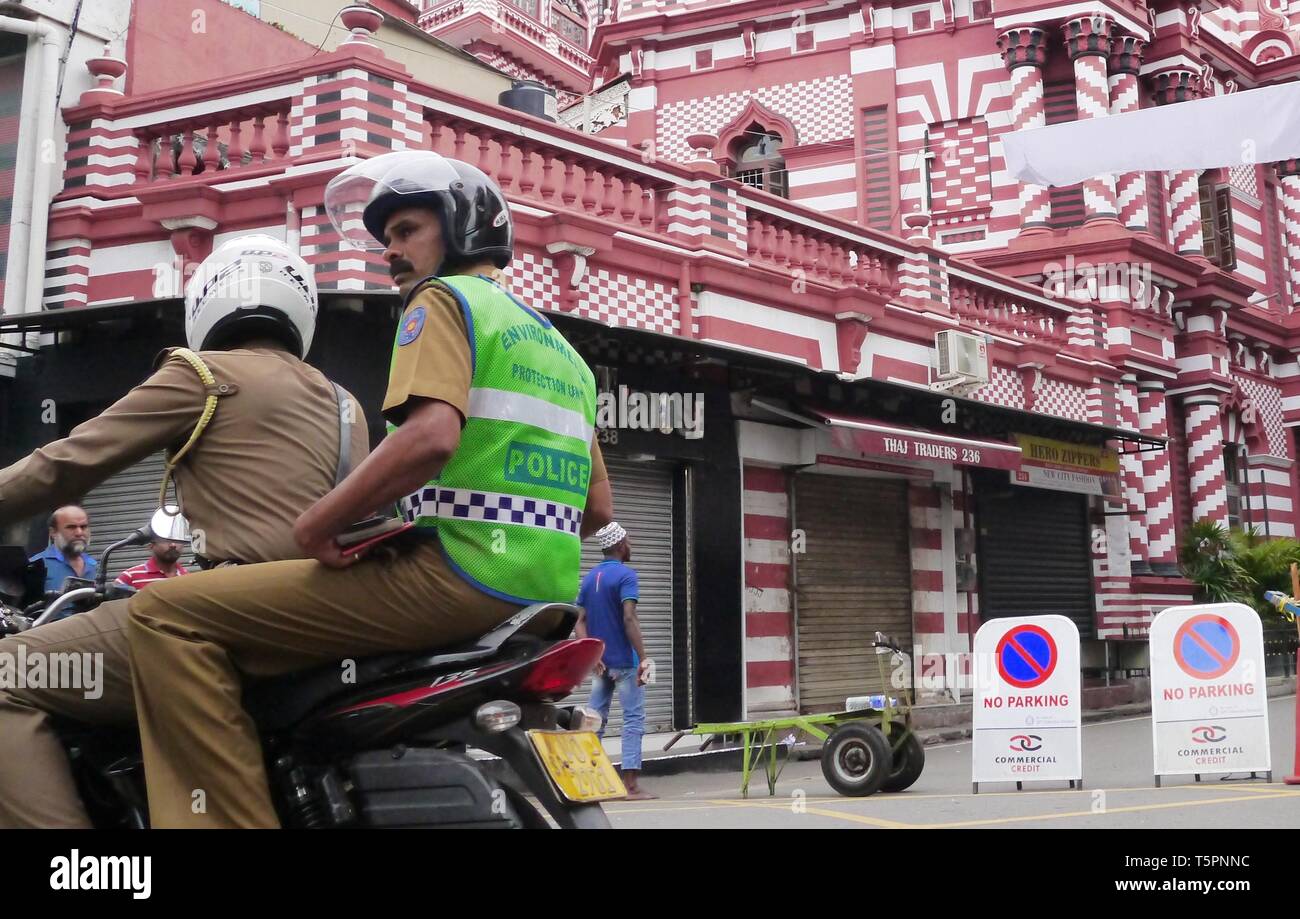 Colombo, Sri Lanka. 26th Apr, 2019. Police officers patrol in Colombo, Sri Lanka, April 26, 2019. Sri Lanka on Thursday revised the death toll from multiple terror attacks on Sunday to around 253 from 359, Sri Lanka's Health Ministry said on Thursday. Credit: Yan Hao/Xinhua/Alamy Live News Stock Photo