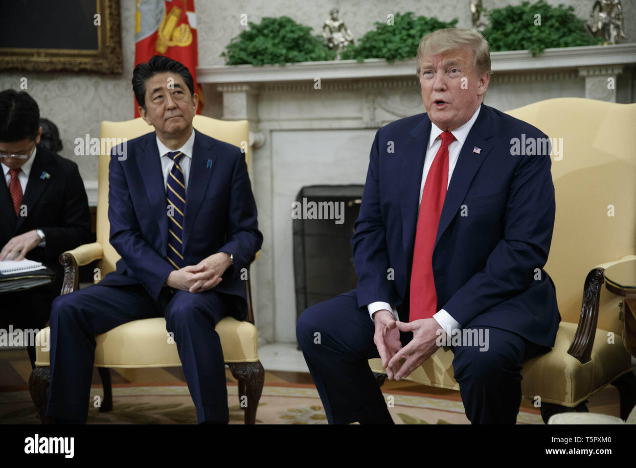 Washington, District of Columbia, USA. 26th Apr, 2019. US President Donald J. Trump meets with Japanese Prime Minister Shinzo Abe in the Oval Office of the White House in Washington, DC, USA, 26 April 2019. President Trump is hosting a dinner for Prime Minister Abe and his wife celebrating the First Lady's 49th birthday.Credit: Shawn Thew/Pool via CNP Credit: Shawn Thew/CNP/ZUMA Wire/Alamy Live News Stock Photo