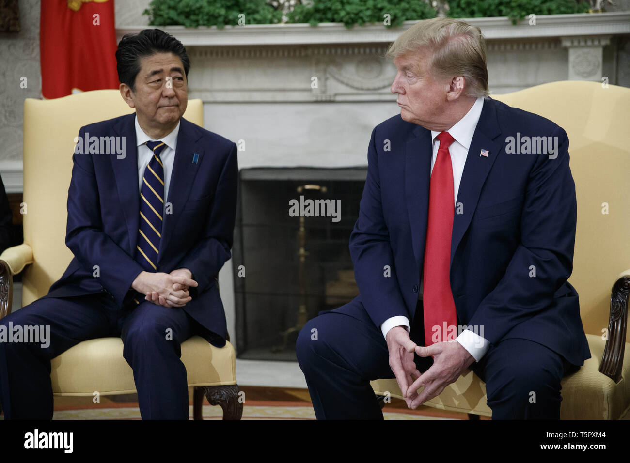 Washington, District of Columbia, USA. 26th Apr, 2019. US President Donald J. Trump meets with Japanese Prime Minister Shinzo Abe in the Oval Office of the White House in Washington, DC, USA, 26 April 2019. President Trump is hosting a dinner for Prime Minister Abe and his wife celebrating the First Lady's 49th birthday.Credit: Shawn Thew/Pool via CNP Credit: Shawn Thew/CNP/ZUMA Wire/Alamy Live News Stock Photo