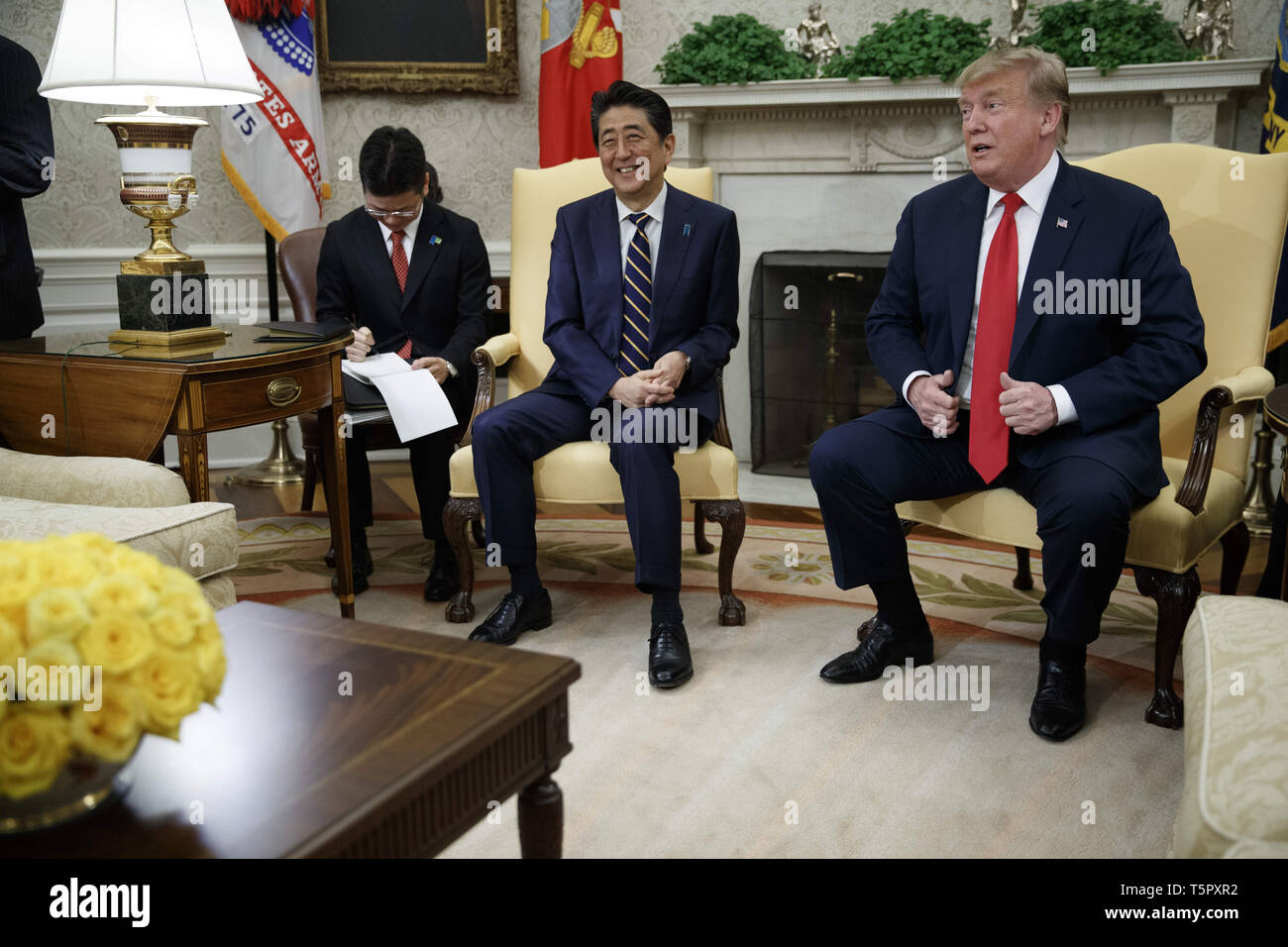 Washington, District of Columbia, USA. 26th Apr, 2019. US President Donald J. Trump meets with Japanese Prime Minister Shinzo Abe in the Oval Office of the White House in Washington, DC, USA, 26 April 2019. President Trump is hosting a dinner for Prime Minister Abe and his wife celebrating the First Lady's 49th birthday.Credit: Shawn Thew/Pool via CNP Credit: Shawn Thew/CNP/ZUMA Wire/Alamy Live News Stock Photo