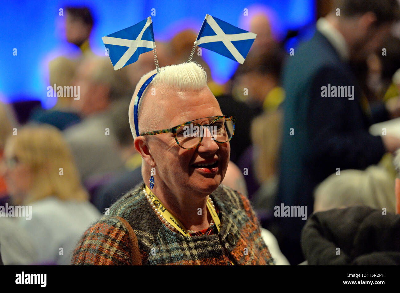 Edinburgh, Scotland, United Kingdom. 27th Apr, 2019. A delegate in colourful in the auditorium at the Scottish National Party's Spring Conference in the Edinburgh International Conference Centre. Credit: Ken Jack/Alamy Live News Stock Photo
