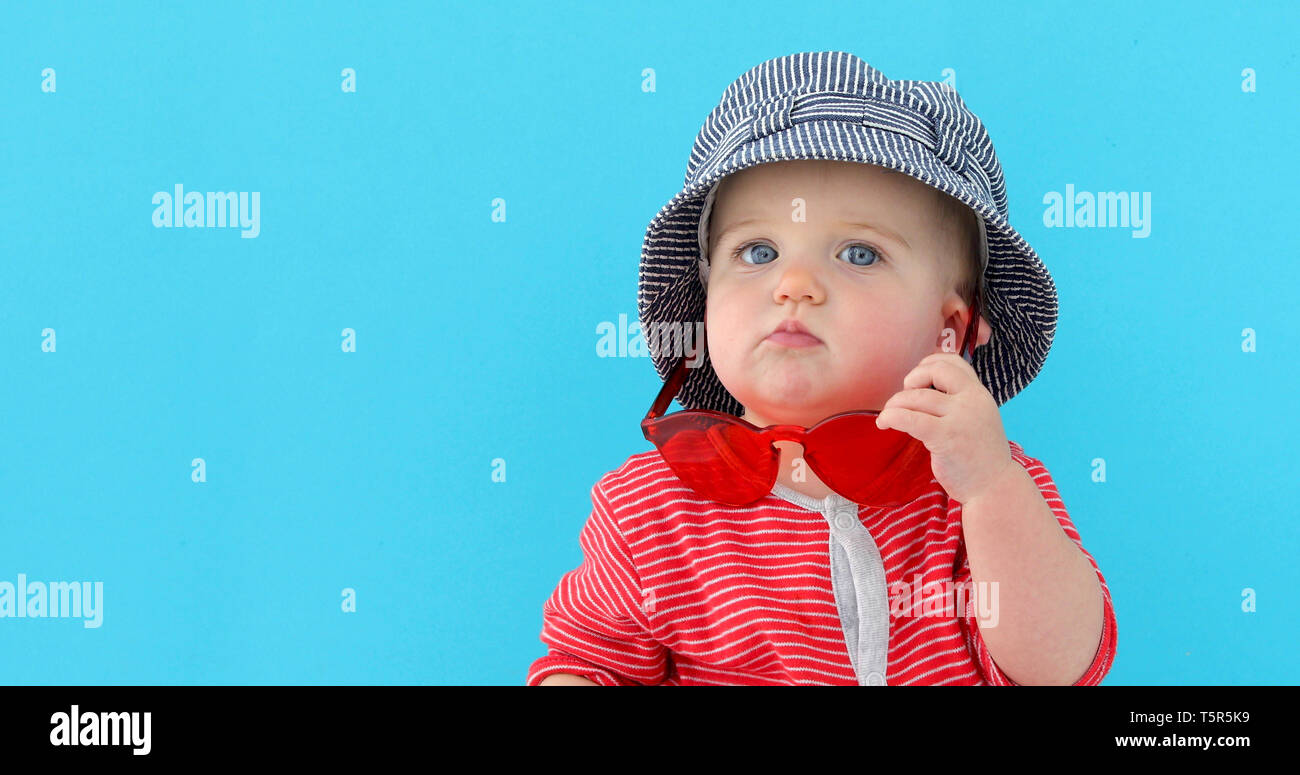 Sweet Baby in summer hat Stock Photo